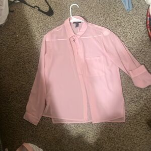 Its a blouse/ button down from Forever 21 and its a sheer pink